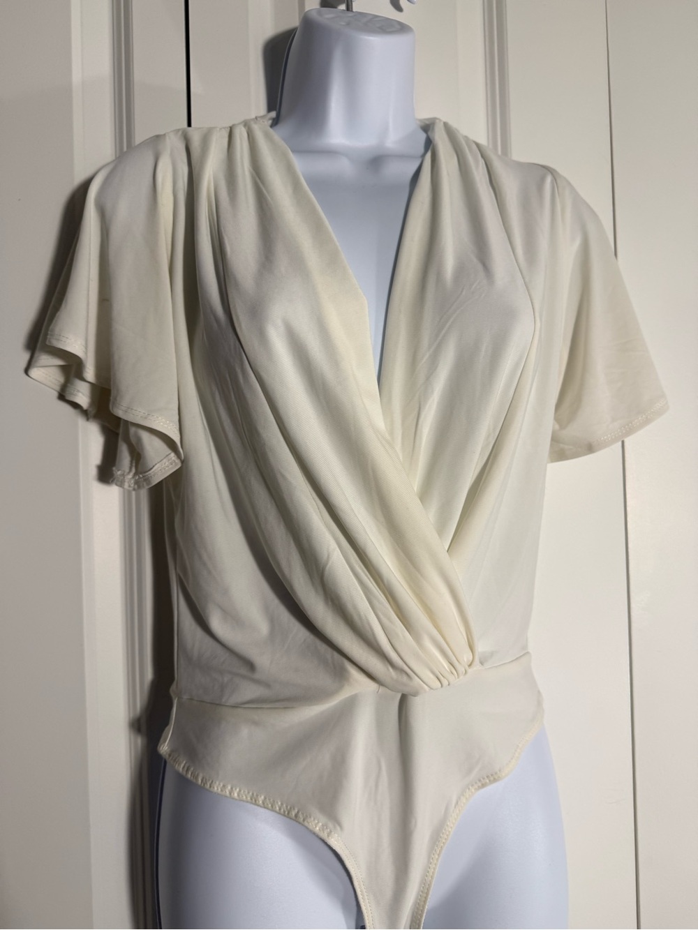 Ivory Surplice Flutter-Sleeve Bodysuit